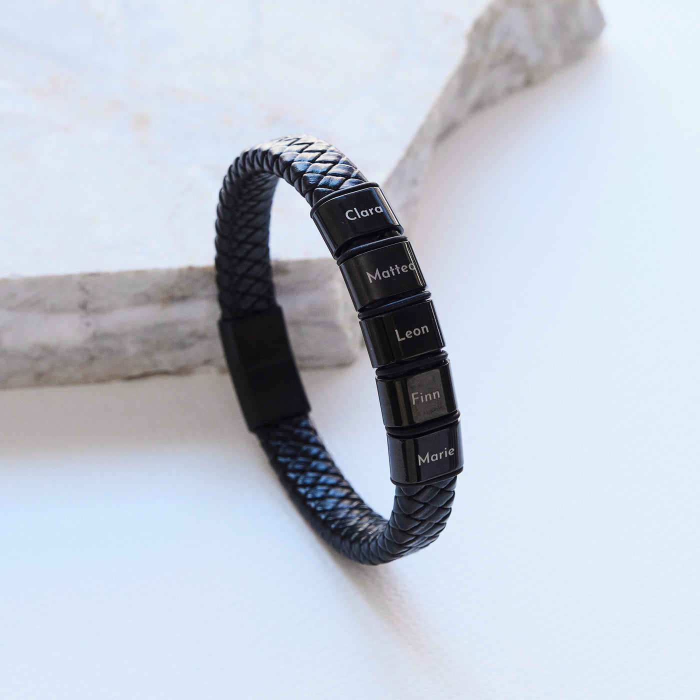 Leather bracelet with engraved black beads