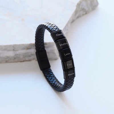 Leather bracelet with engraved black beads