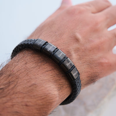 Leather bracelet with engraved black beads