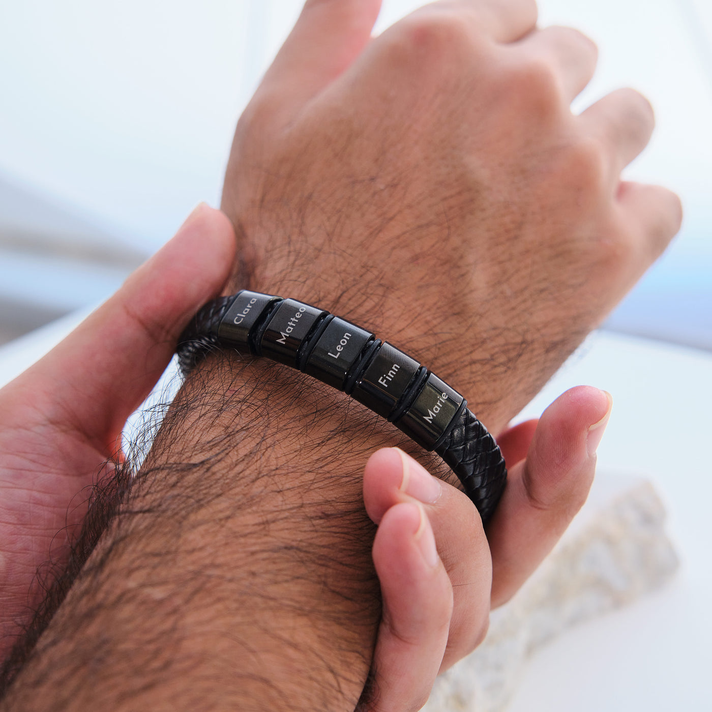 Leather bracelet with engraved black beads