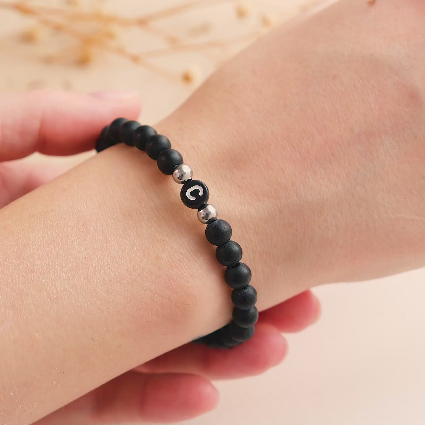 Initial couple bracelet with black beads